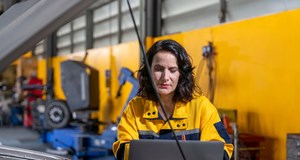 Woman working in an automotive setting