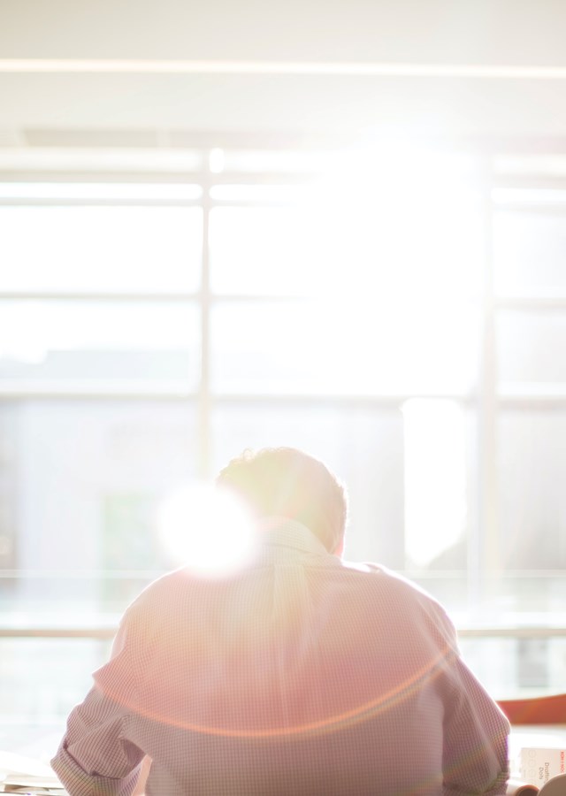 Man sitting alone in a break room